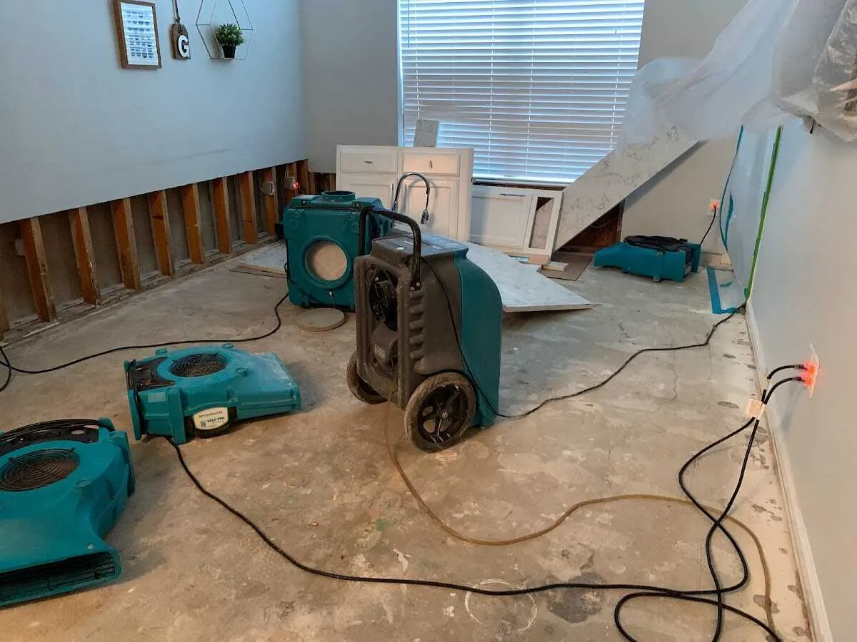 Dehumidifier in flood-cut room for Water Damage Restoration in Rosedale